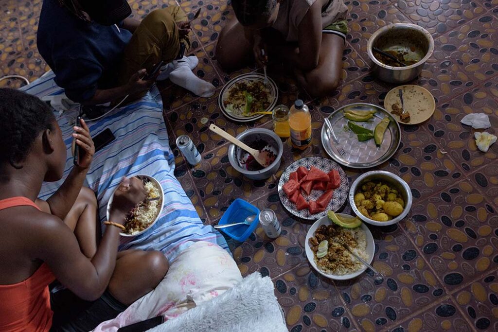 A-group-of-friends-in-the-LGBTQ-community-share-a-meal-together-in-kampala-inside-a-safe-shelter-in-Uganda