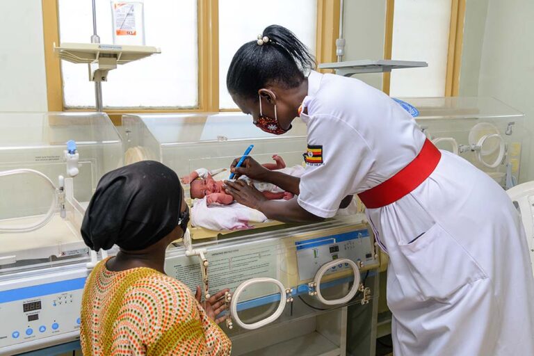 A-health-worker-from-the-ministry-of-health-in-Uganda-examins-a-newborn-baby-in-an-incubator-is-part-of-an-exercise-to-improve-maternal-health-in-remote-areas-in-Uganda