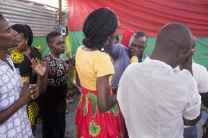 A-lady-annet-is-prayed-for-by-her-pastor-in-kalerweUganda